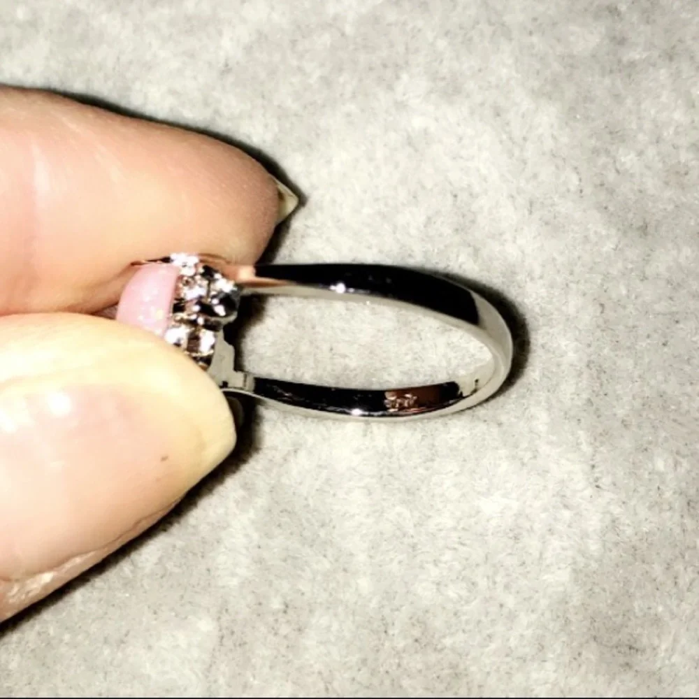 BRAND NEW.925SS OVAL CUT PINK OPAL RING